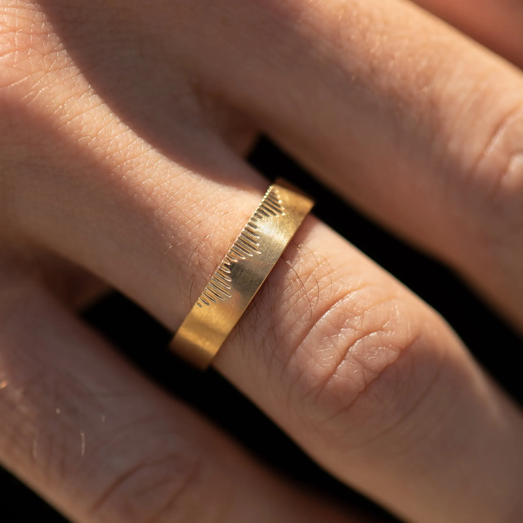 Golden Wedding Band with Linear Mountains