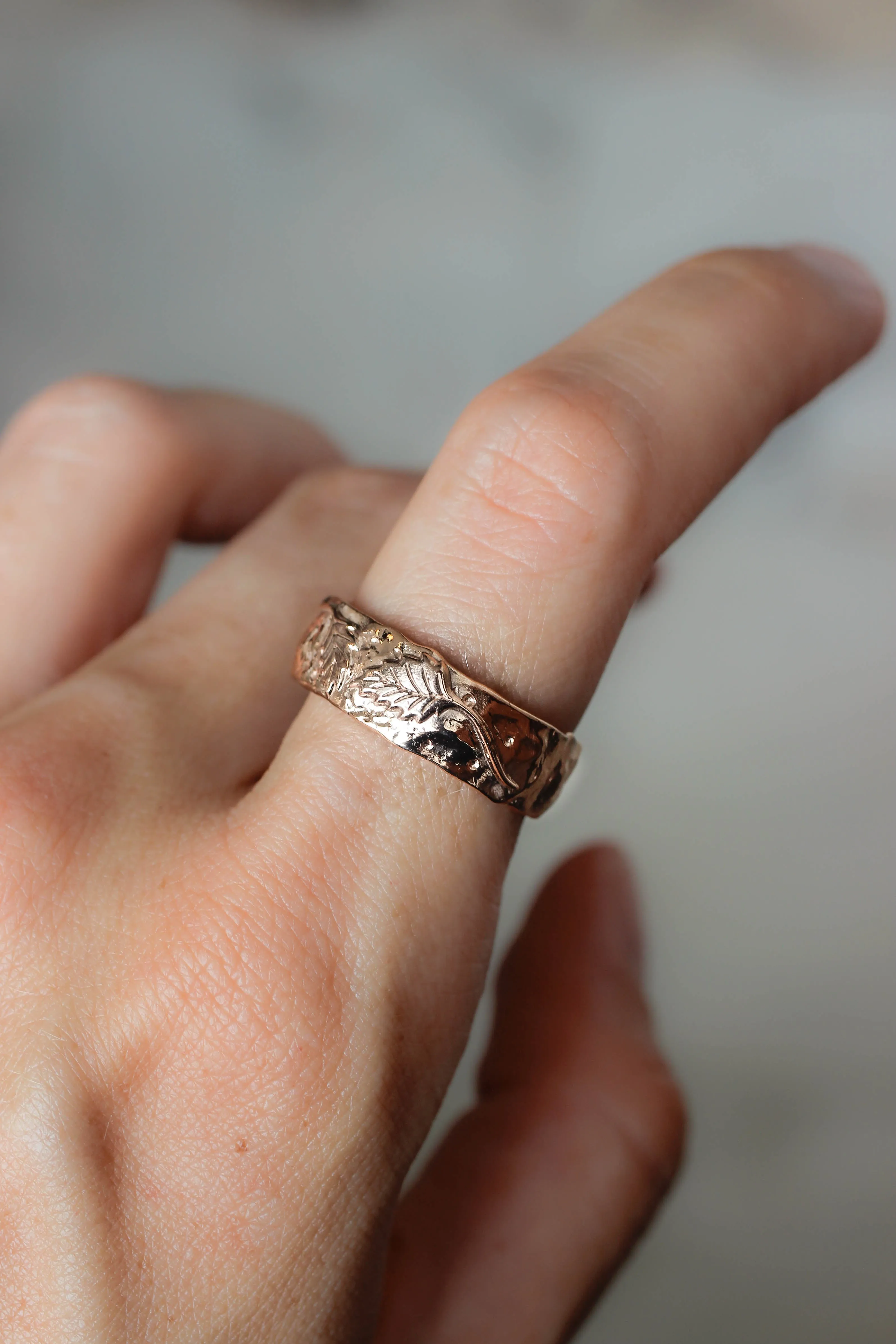 Textured ring with two leaves, man's wedding band