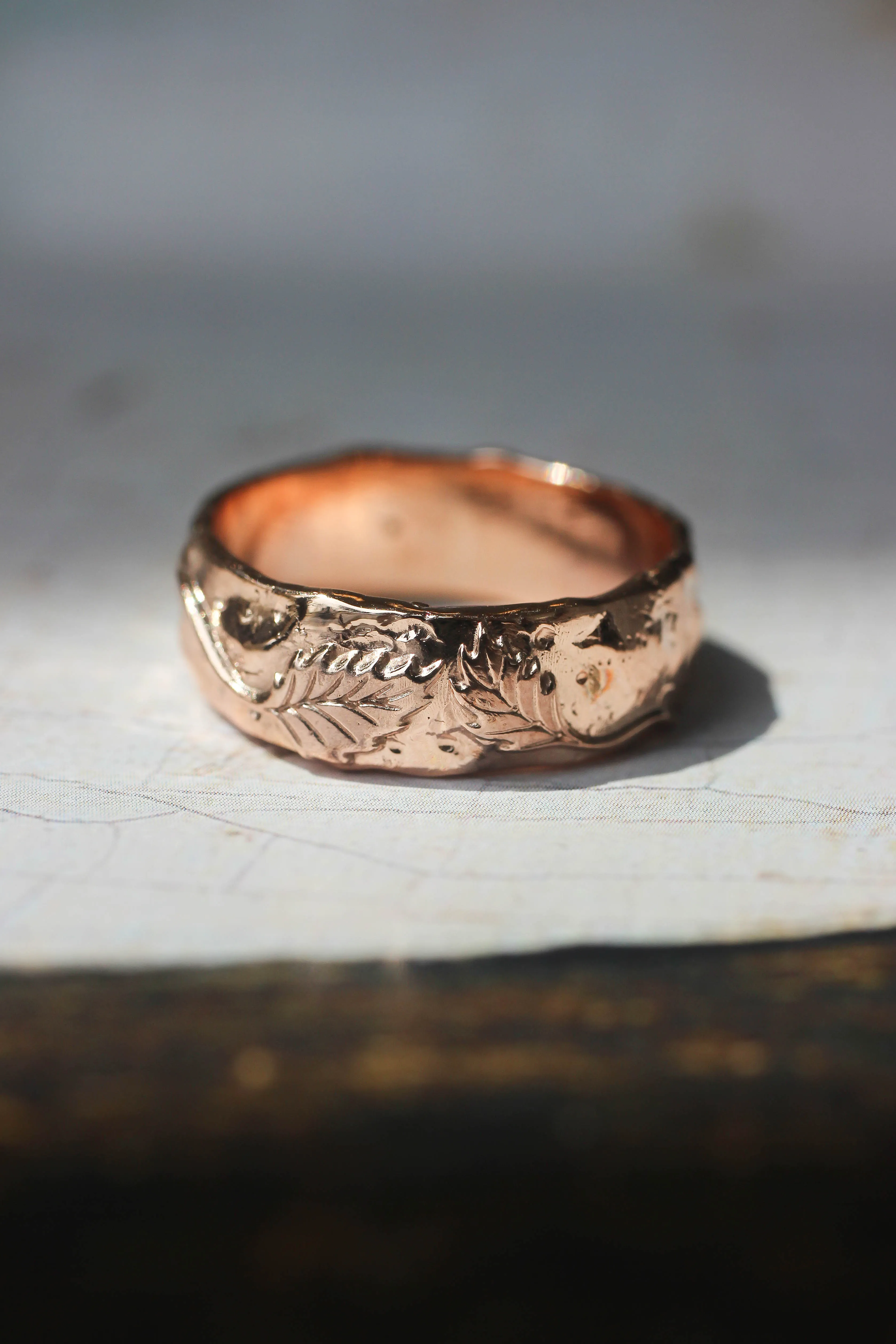 Textured ring with two leaves, man's wedding band