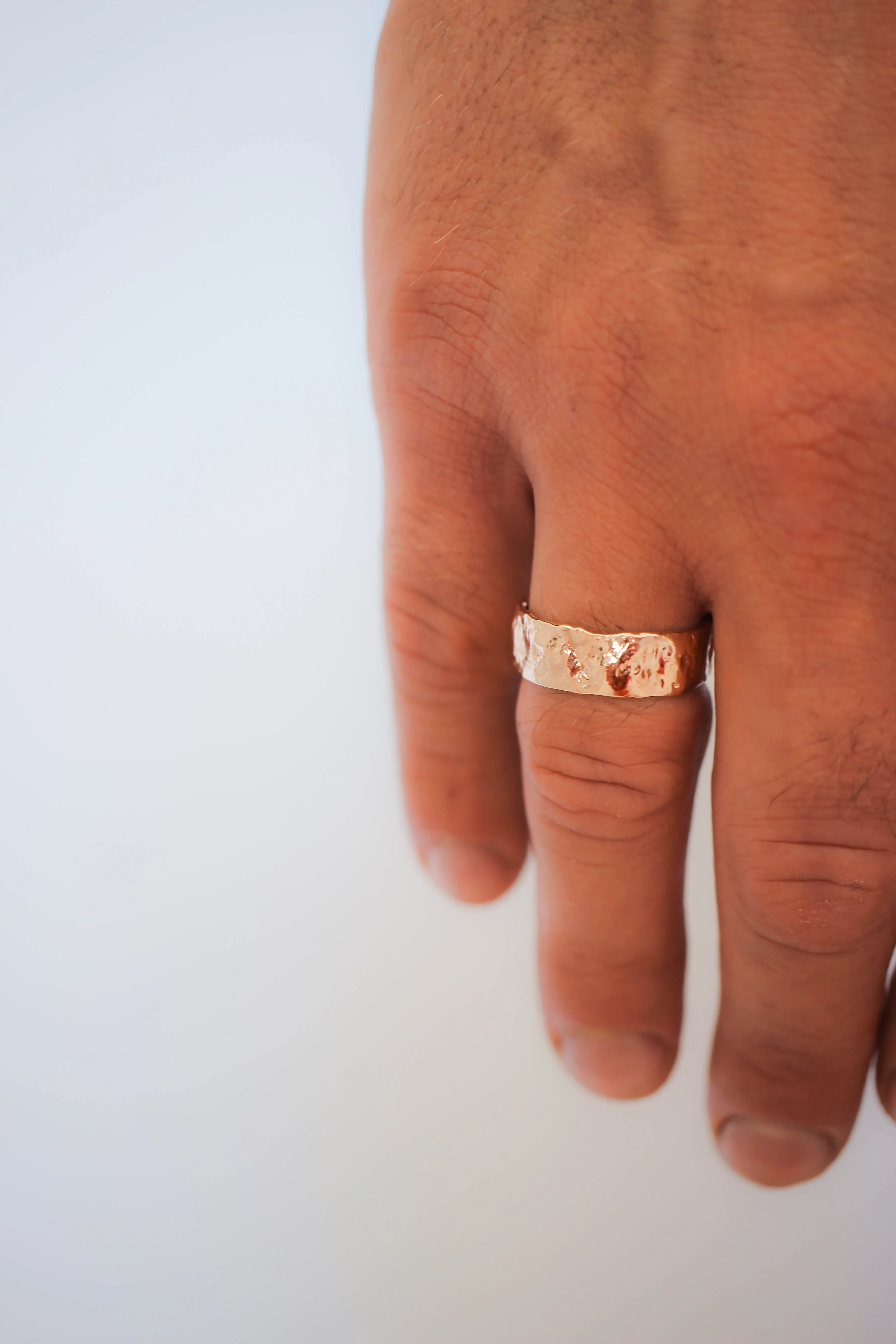 Textured ring with two leaves, man's wedding band