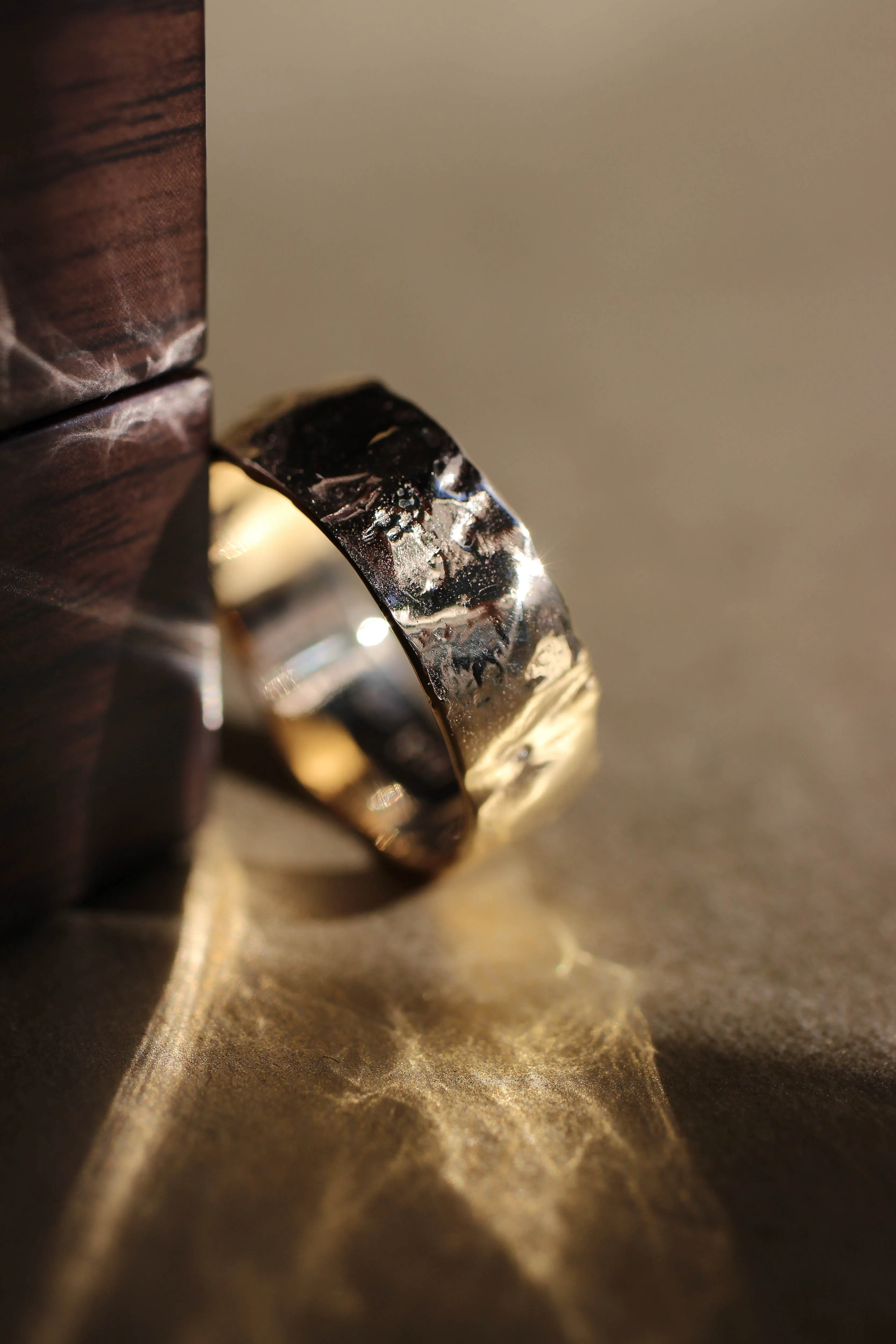 Textured ring with two leaves, man's wedding band