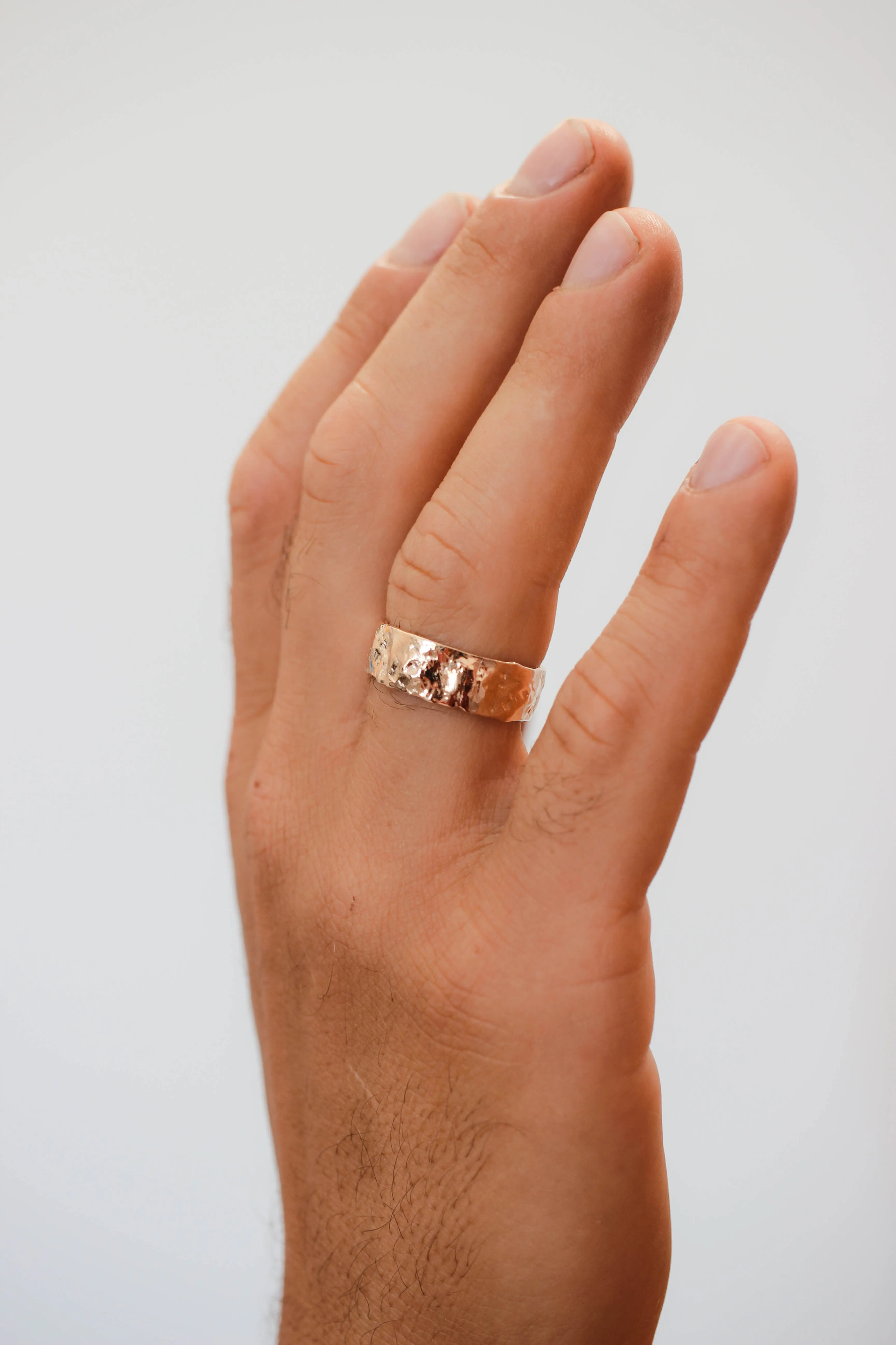 Textured ring with two leaves, man's wedding band